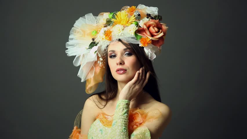 Portrait of beautiful and sexy woman wearing hat