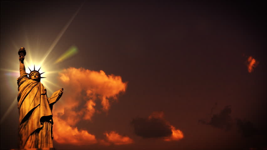 Liberty statue at sunset, time lapse clouds