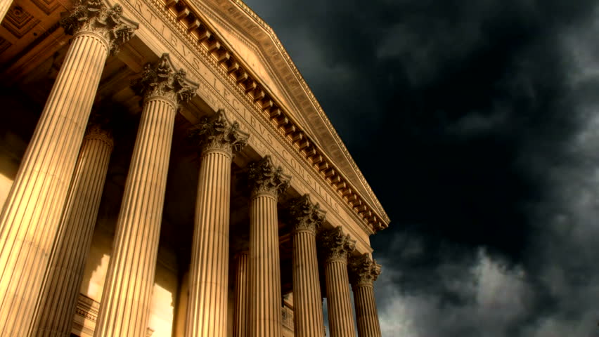Timelapse clouds over classical building