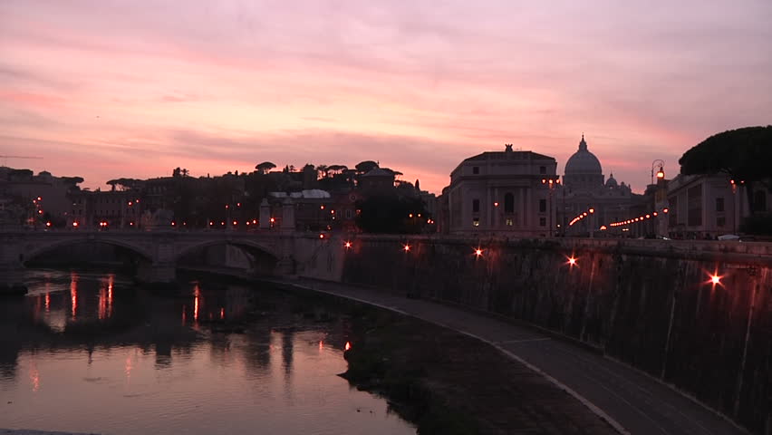 Italy, Rome, The Tiber and the Papal Basilica of Saint Peter at dusk 