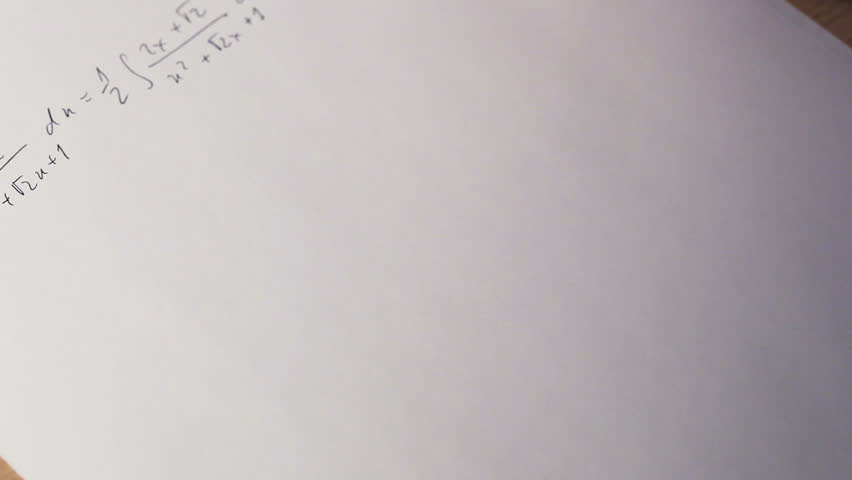 Writing math equations on paper. Fast motion effect. 