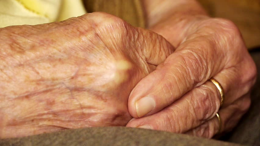 Senior old woman young man hold hand wrinkle skin close up  