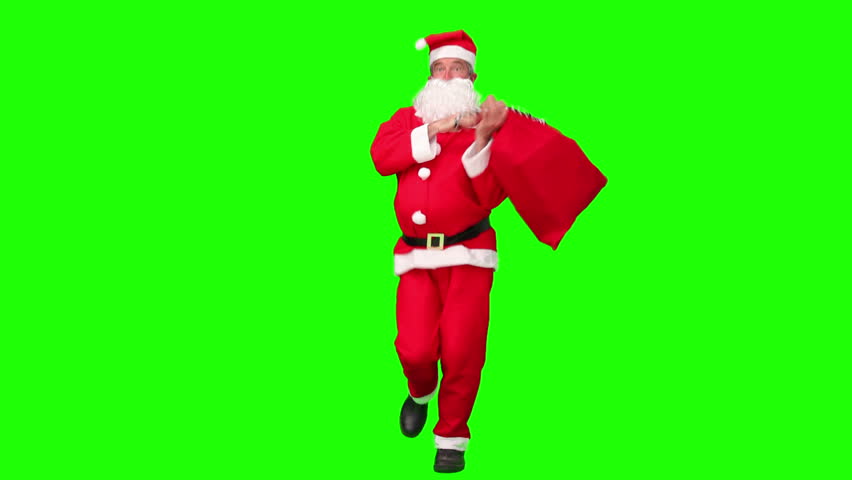Chroma-key footage of Santa Claus dancing in costume