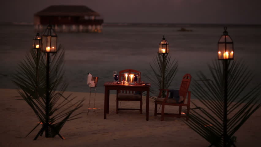 lonely dining table on a beach 