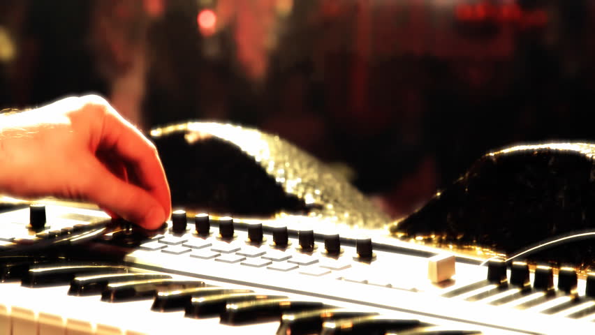 DJ hands on the synthesizer