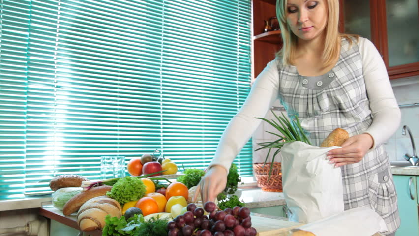 Pregnant woman with Groceries
