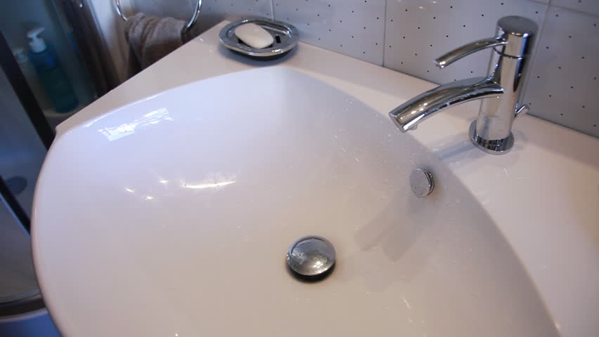 Man washing his hands
