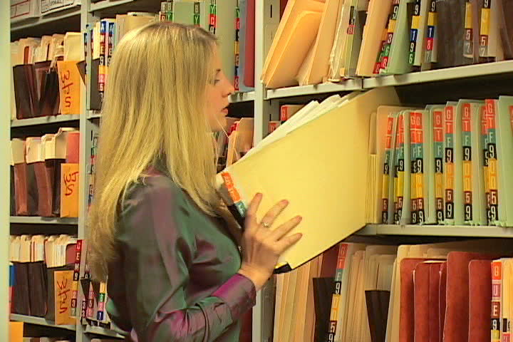 Woman with paperwork