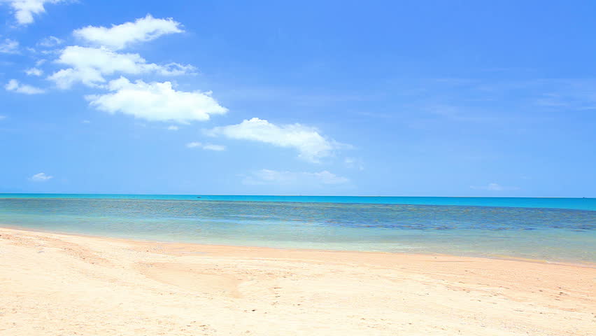  waves landing on sandy beach
