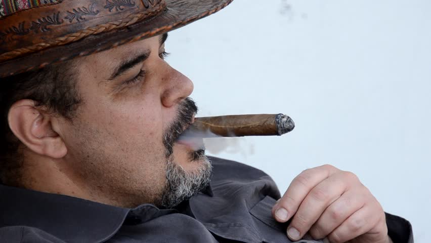 man smoking cigar 