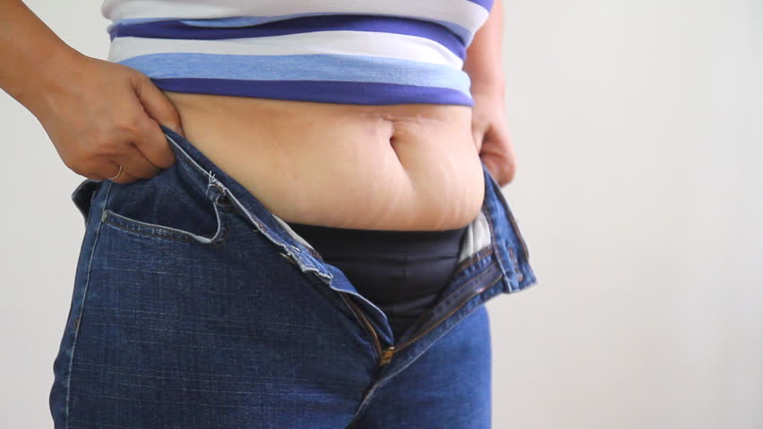 Fat woman trying to fit a small jeans