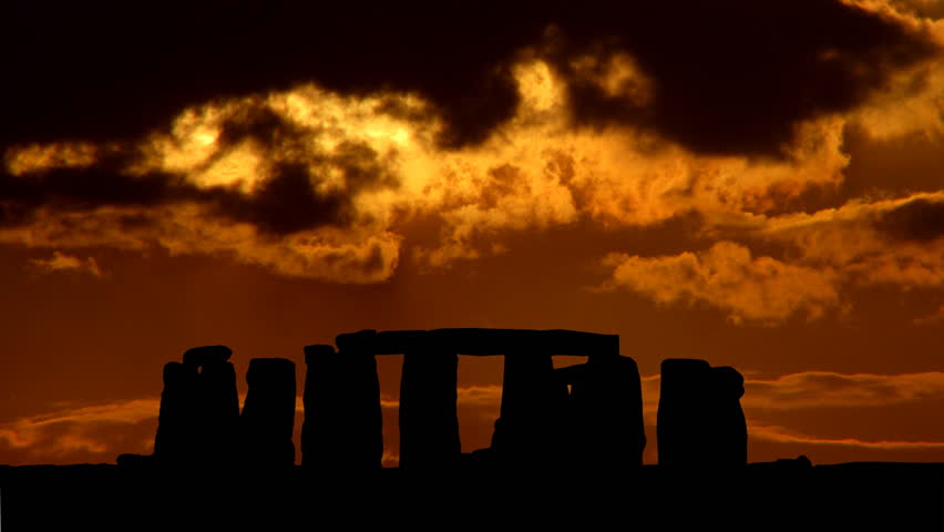 Golden sunset behind the Stonehenge.