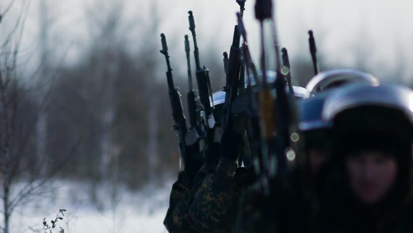 SWAT silhouettes of soldiers in the winter landscape