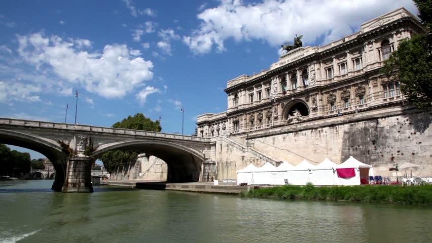 Ponte Umberto I and Edifice of The Supreme Court of Cassation, shown in motion from the river