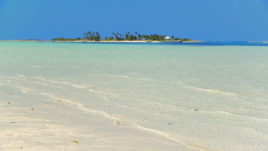 Caucasian couple in swimwear with snorkeling gear running into the ocean