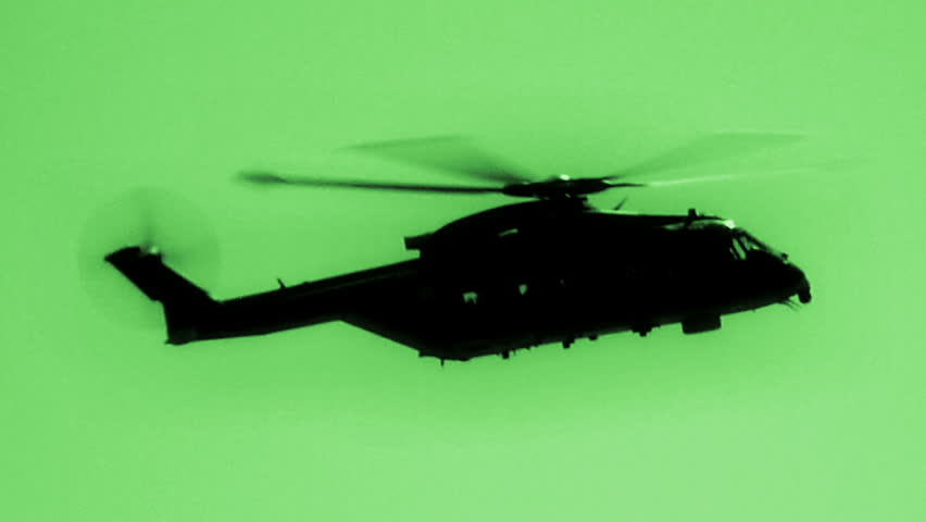 Merlin military helicopter filmed in night vision.