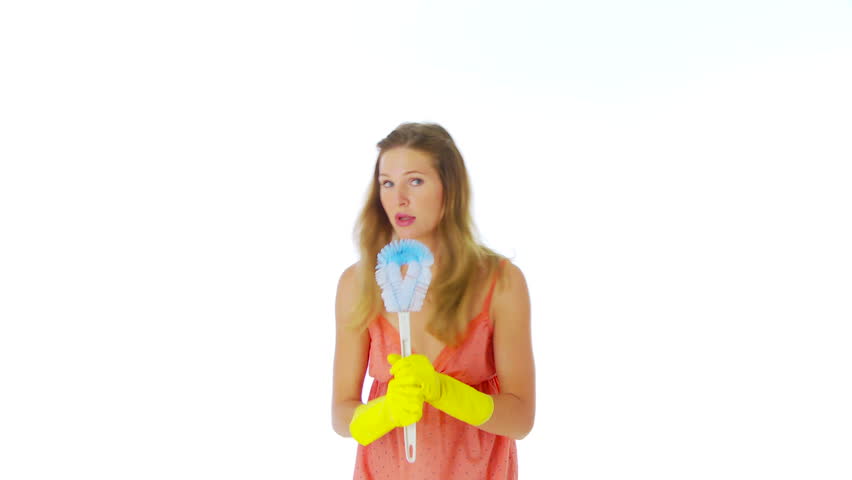 Woman singing with toilet brush