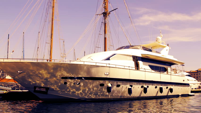 a large luxury yacht in marseille's vieux port harbour, france