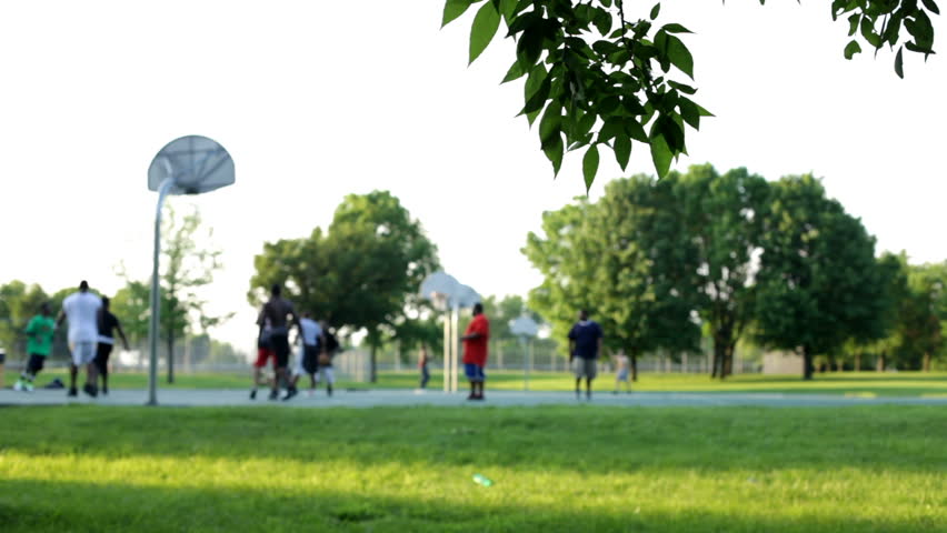 Background in Park of people playing basketball