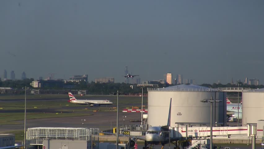 LONDON ENGLAND - JUNE 02: British Airway Airplanes land during rush hour in Heathrow, London, England June 02, 2011. London Heathrow Airport or Heathrow is the busiest airport in the United Kingdom and the fourth busiest airport in the world.