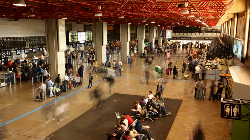 SAO PAULO, BRAZIL - JUNE 26: Passengers and world travelers check in at Guarulhos Airport, Sao Paulo Brazil June 26 2011. Guarulhos is the main airport serving SÃÂ£o Paulo, Brazil.