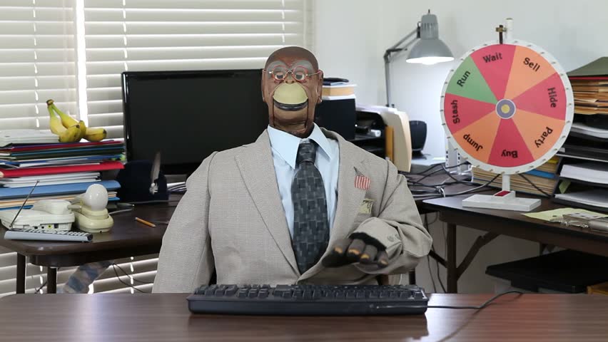 Monkey puppet smacks keyboard in frustration.  