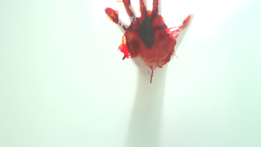 Bloody hand on glass window