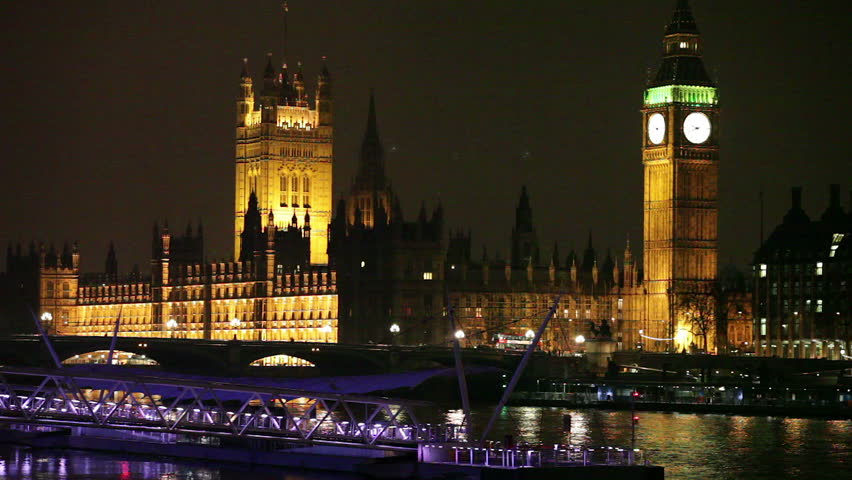 London skyline at night with Big Ben, Houses of Parliament, Westminster Bridge, and Thames River