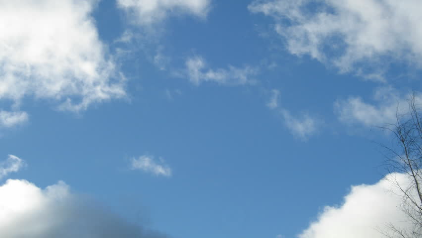 Time-lapse of fast moving midday clouds 1 