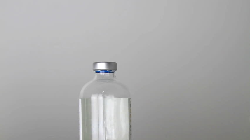 medical/medicine injection vials, macro close up with camera motion.