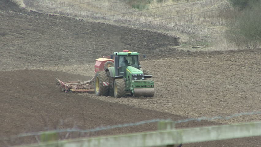 Farmer sowing seed - front view 2.  HD