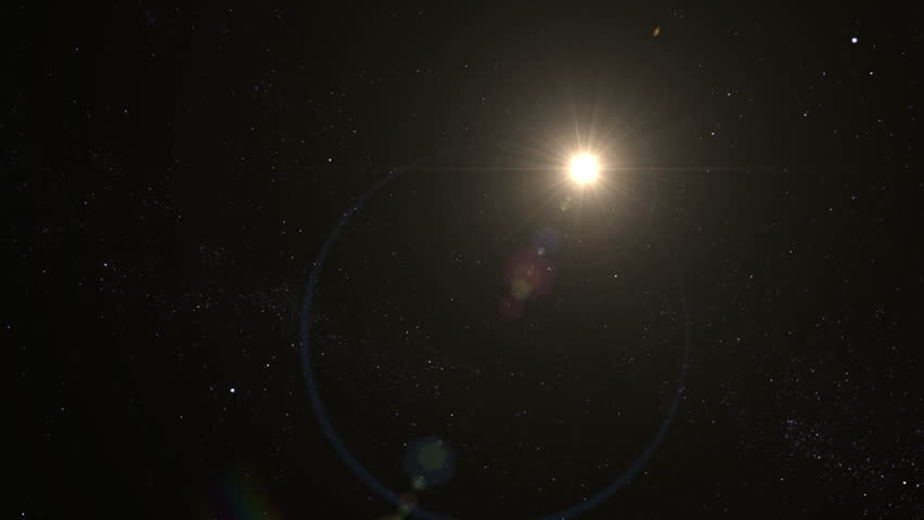 Camera panning from the sun to the rotating Earth. Florida and the Caribbean are visible, followed by a large bright cloud layer. Elements of this image furnished by NASA