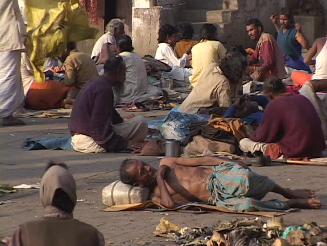 INDIA - CIRCA 2010: Poor people lay out on the ground circa 2010 in India.