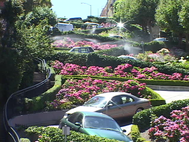 Cars wind down Lombard Street in San Francisco, California.