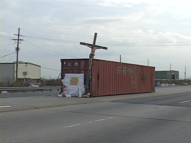 A small shrine adorns a storage bin for St. Bernard Parish following Hurricane Katrina.