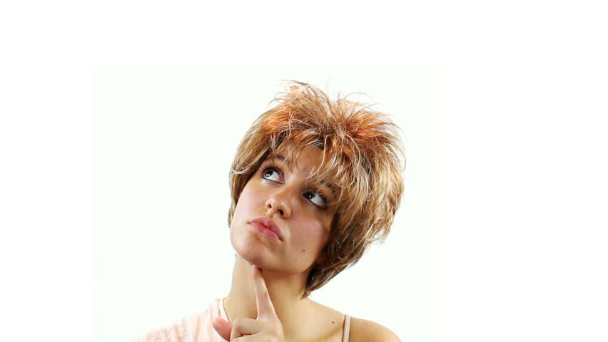 Portrait of beautiful woman with hand on chin. Looking up into the corner.