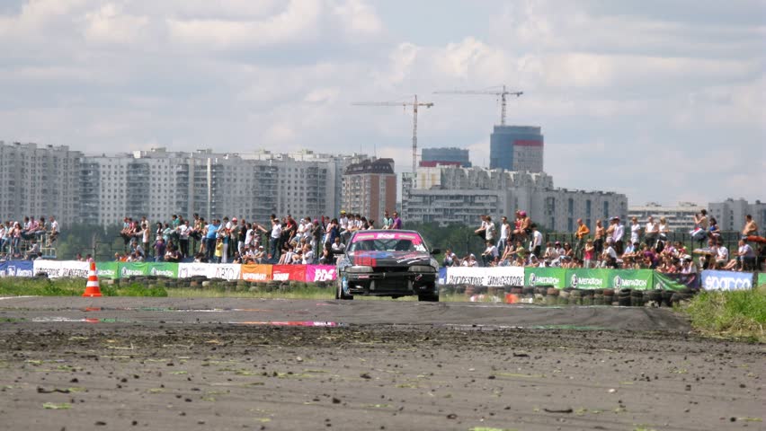 MOSCOW - JUNE 11: (Timelapse View) Drift racing on new highway MegaFon Tushino, June 11, 2011 in Moscow, Russia. MegaFon is main sponsor of drift Championship RDS 2011.