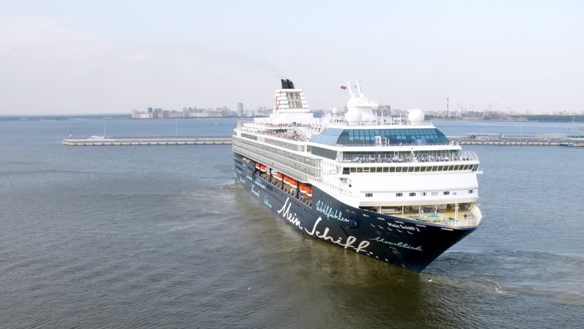 SAINT PETERSBURG, RUSSIA - JULY 19: Mein Schiff liner turn around in port on July 19, 2011 in Saint Petersburg, Russia. Mein Schiff 2 is a Century class cruise ship, built in 1997 in Papenburg, Germany for Celebrity Cruises.