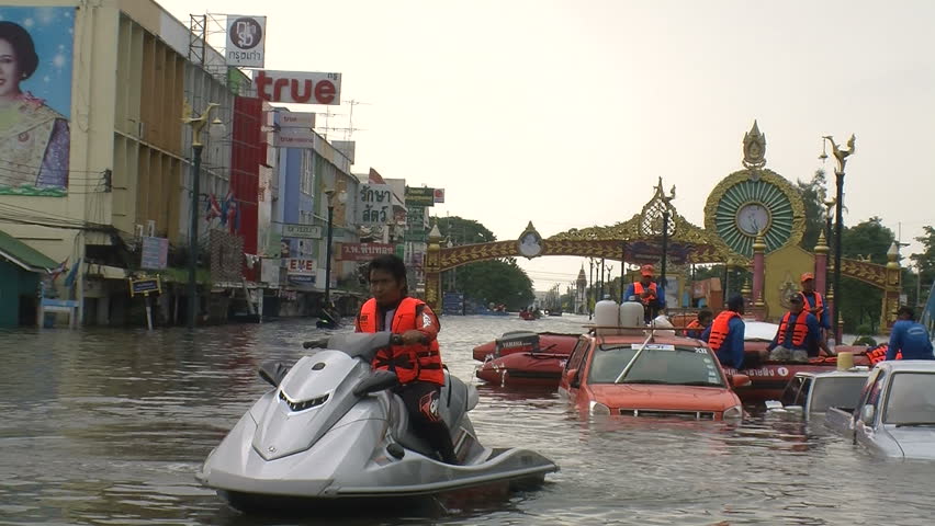AYUTTHAYA, THAILAND - OCTOBER 12: Floods inundate city residents on October 12, 2011, Ayutthaya, Thailand. Parts of Thailand are now experiencing the worst floods in half a century, as water inundates villages, historic temples, farms, and factories.