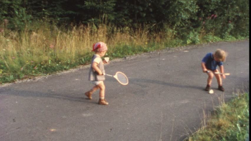 Children play shuttlecock (vintage 8 mm amateur film)