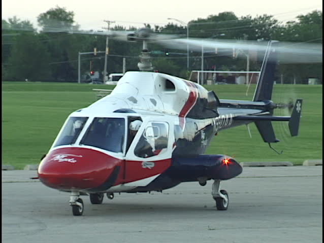 pilot enters medical helicopter