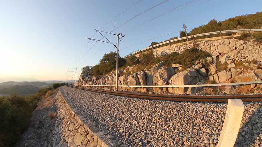 Low angle shoot of train passing (fish eye lens, two sequences)