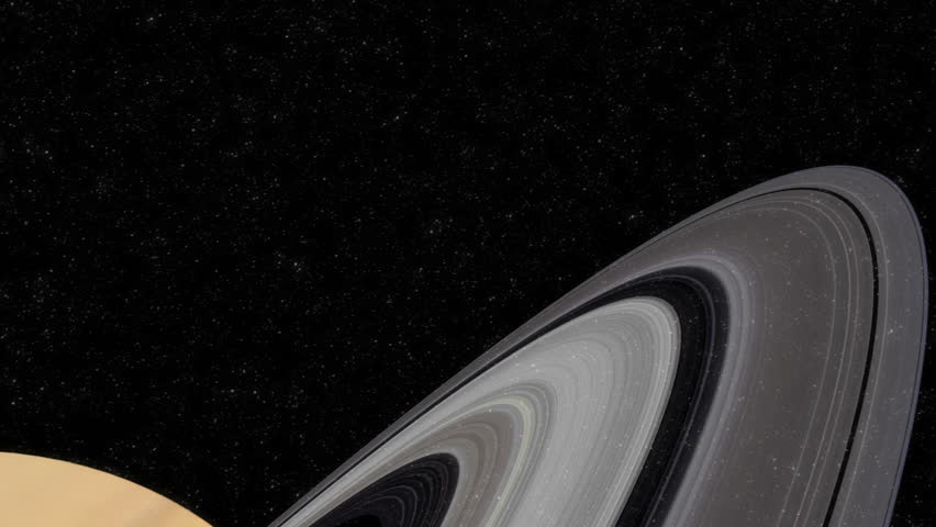 camera flying through ring system of saturn