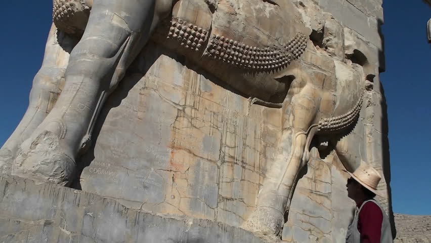 A bas relief carved in stone in the ruins of the ancient city of Persepolis in Iran.