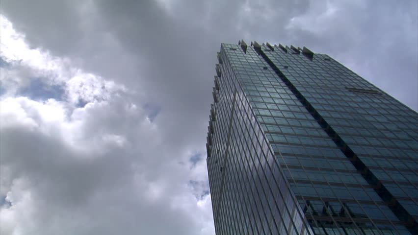 dark clouds over building time lapse