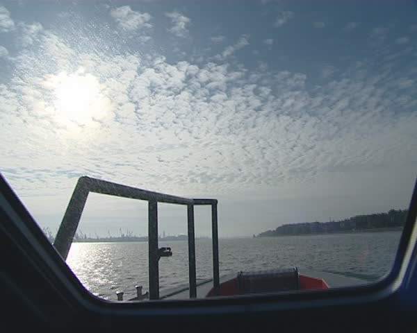 View from the captain cabin. Sky and water expanse. 