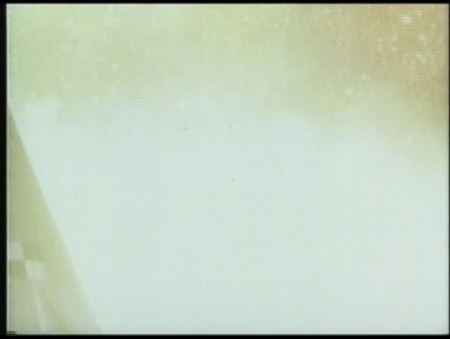 HOUSTON, TX - CIRCA 1960s: Rocket launches from its platform in slow motion circa 1960s in Houston.