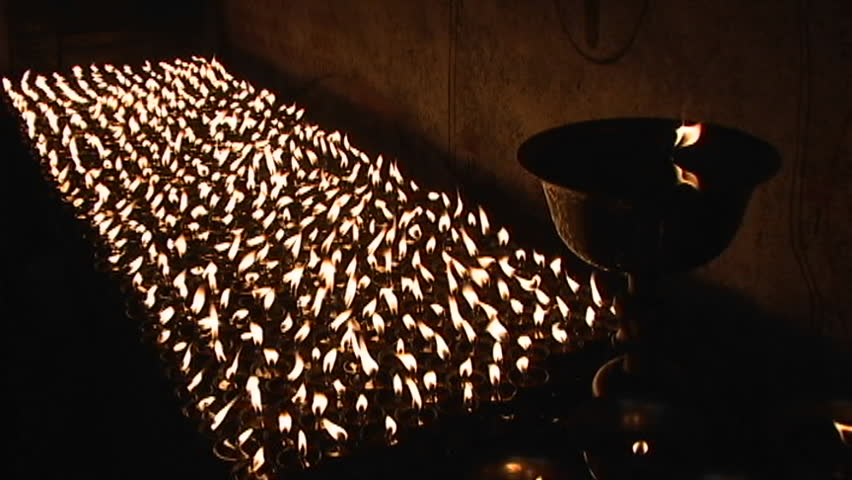 Buddhist candles burn inside a small temple circa 2005 in Kathmandu.