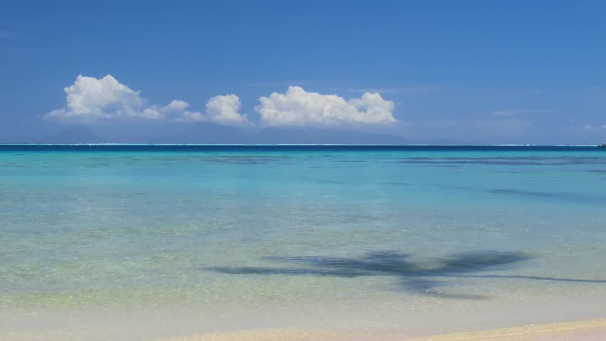 Time Lapse Clouds over Beach, Huahine, French Polynesia (Raiatea in far distance)