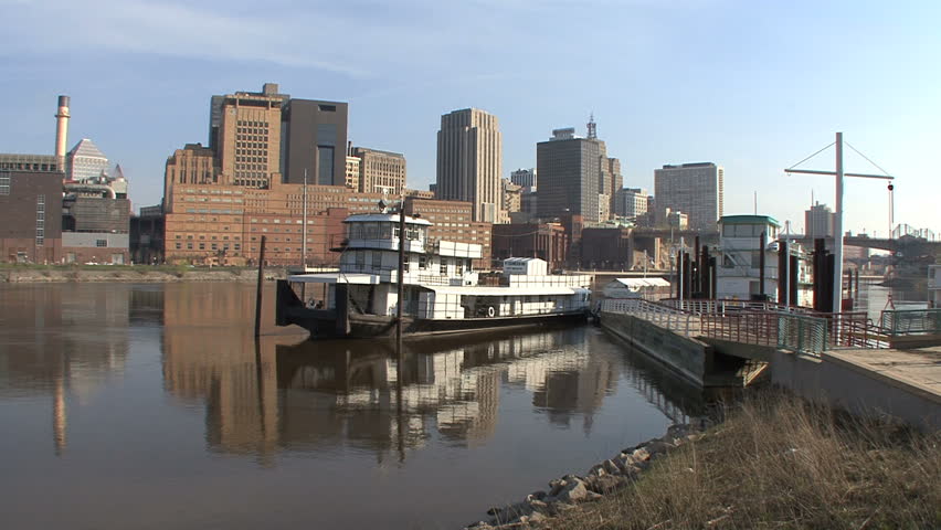 October - 2011 - St. Paul, Minnesota - Boardwalk with barges on the Mississippi River